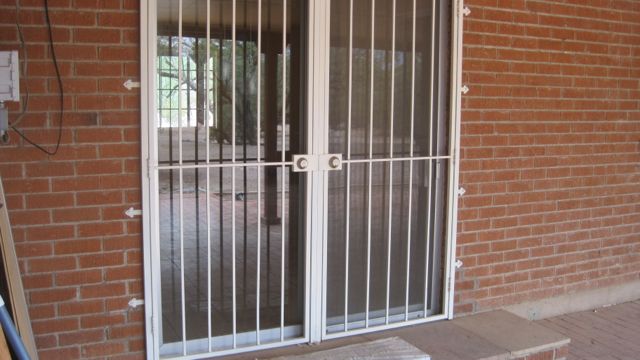 Security bars on all doors and windows